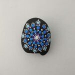 Piedra flor azul y morado